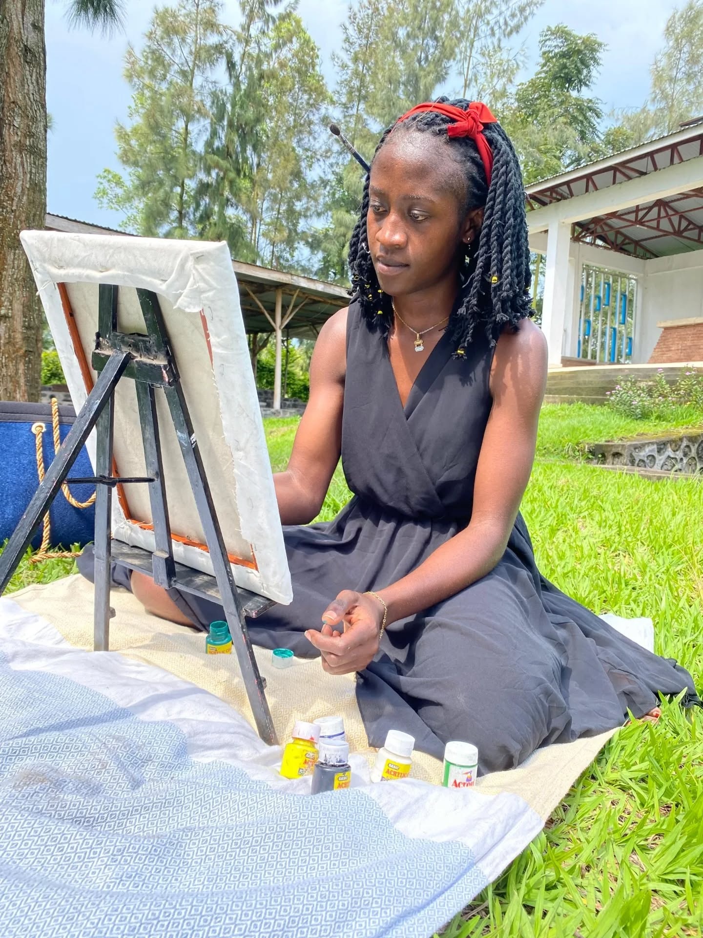 Africa Tulinabo jeune dessinatrice prometteuse à Goma